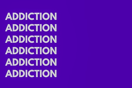 The image features the word 'ADDICTION' repeated six times vertically in bold, white capital letters against a solid purple background.