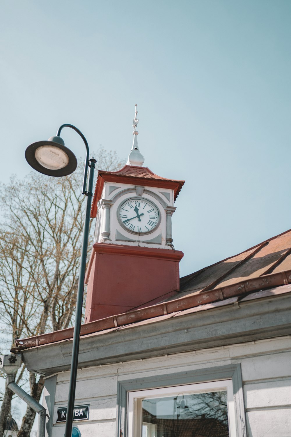 red and white tower clock