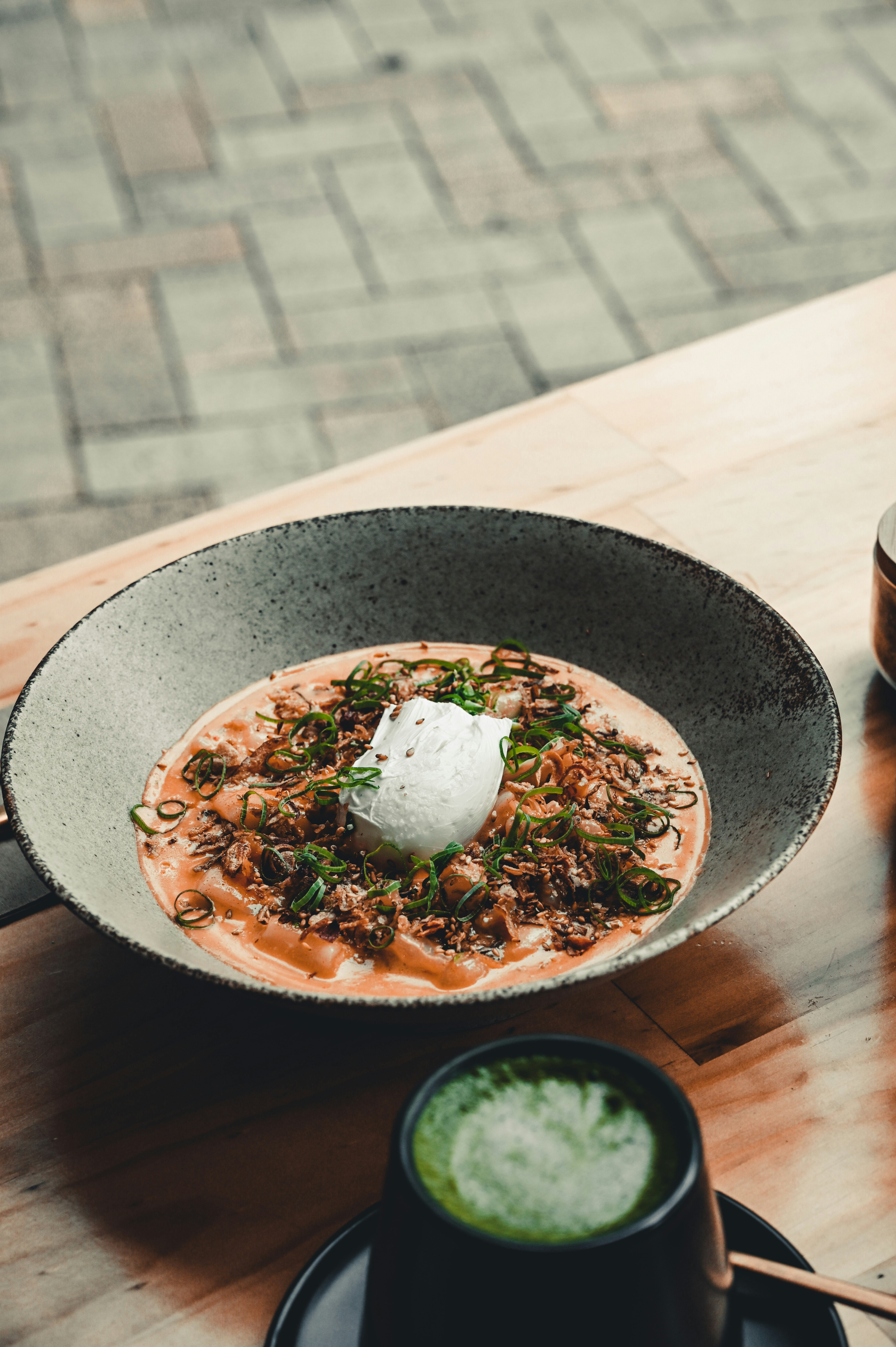 cooked food on black and white ceramic bowl