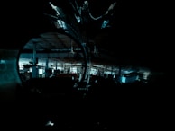 An industrial scene showcasing the machine with soft shadows on a concrete floor.