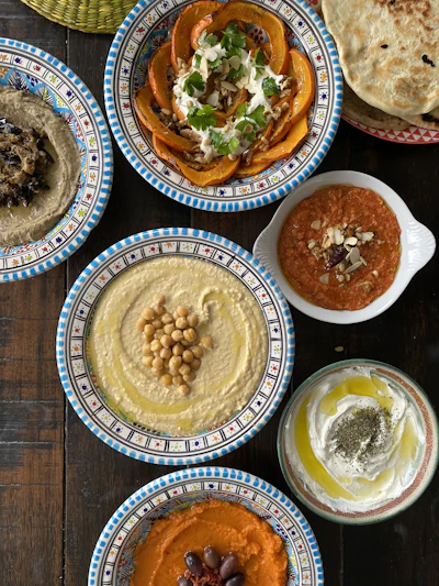 Middle Eastern mezze spread with assorted small dishes on a table