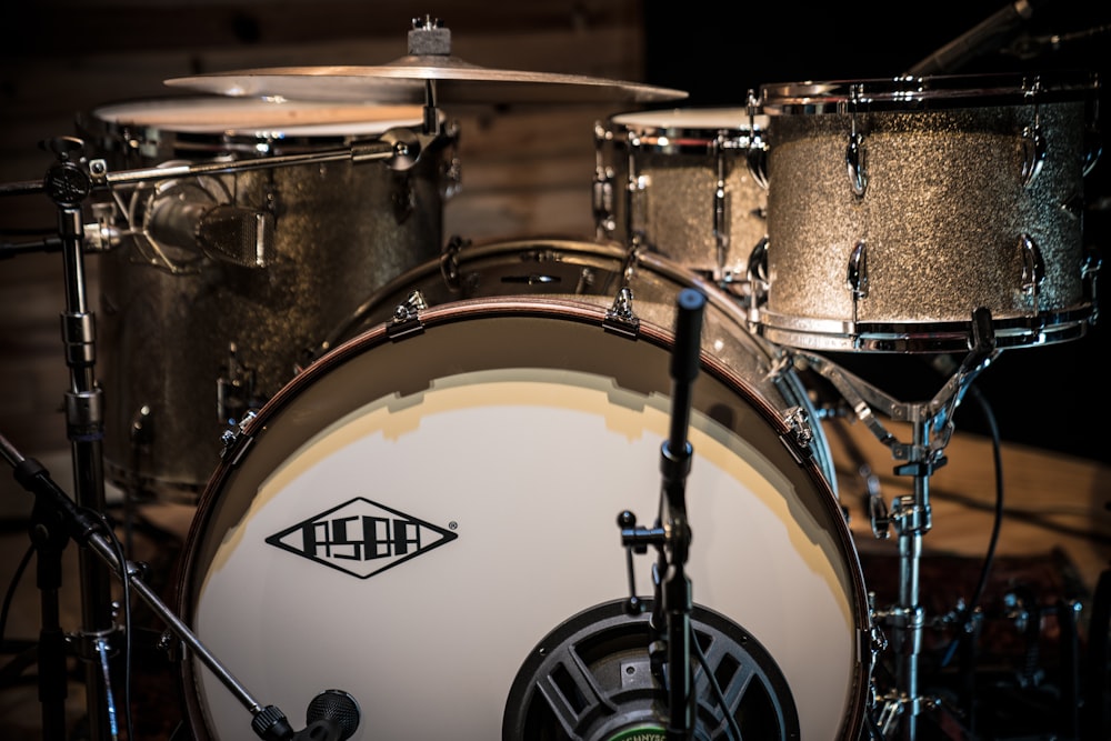 brown and white drum set