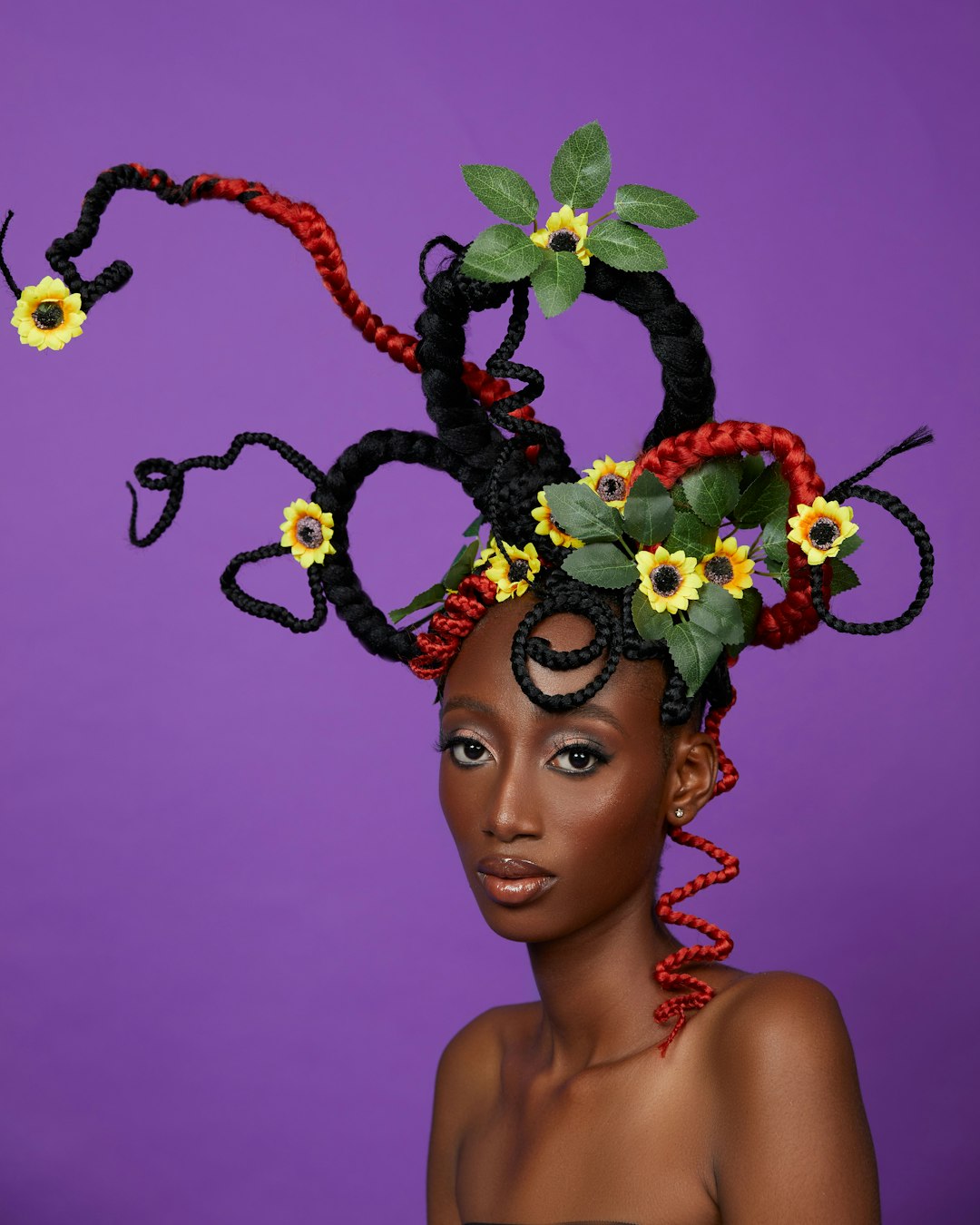 woman with yellow and green floral headdress