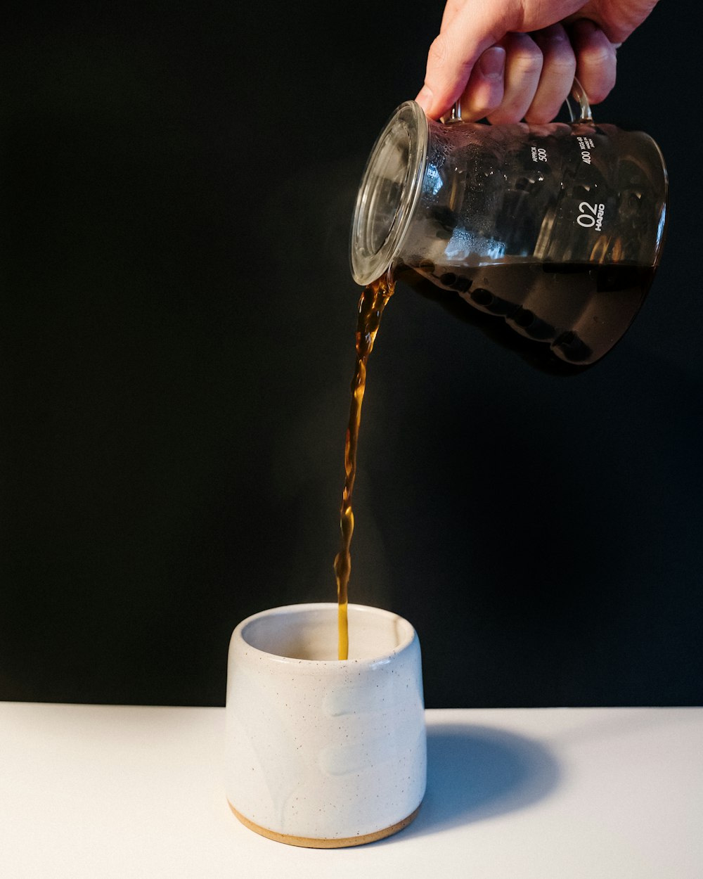 clear glass mug on white tissue paper