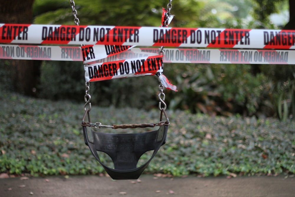 a swing that has been taped off with tape