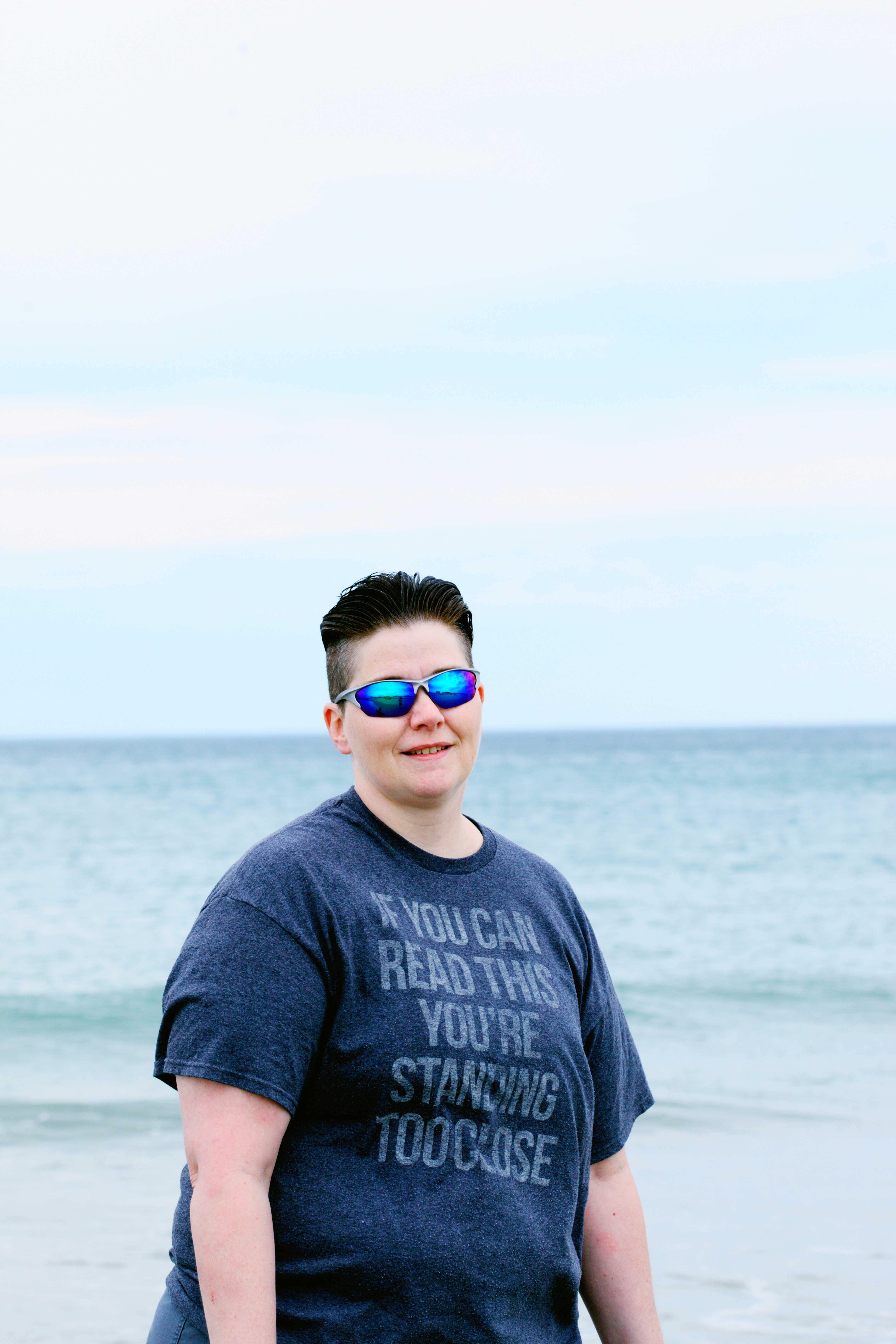 Social distancing at the beach. The tee shirt says it all! If you can read this you're standing too close.