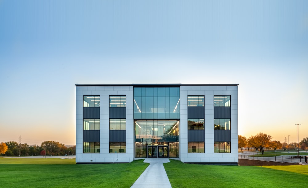 white and gray concrete building under white sky during daytime