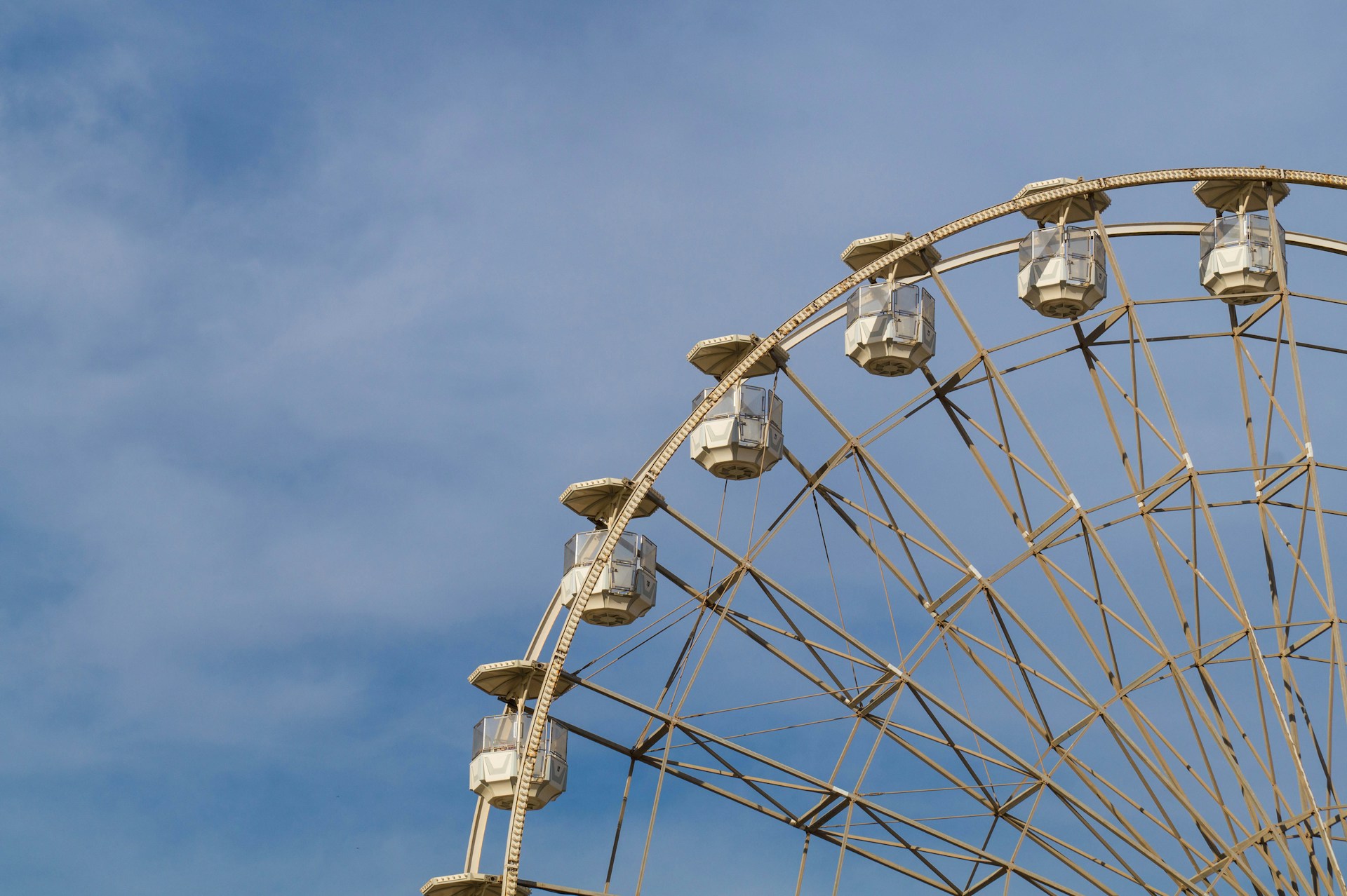 white ferris wheel under blue sky during daytime