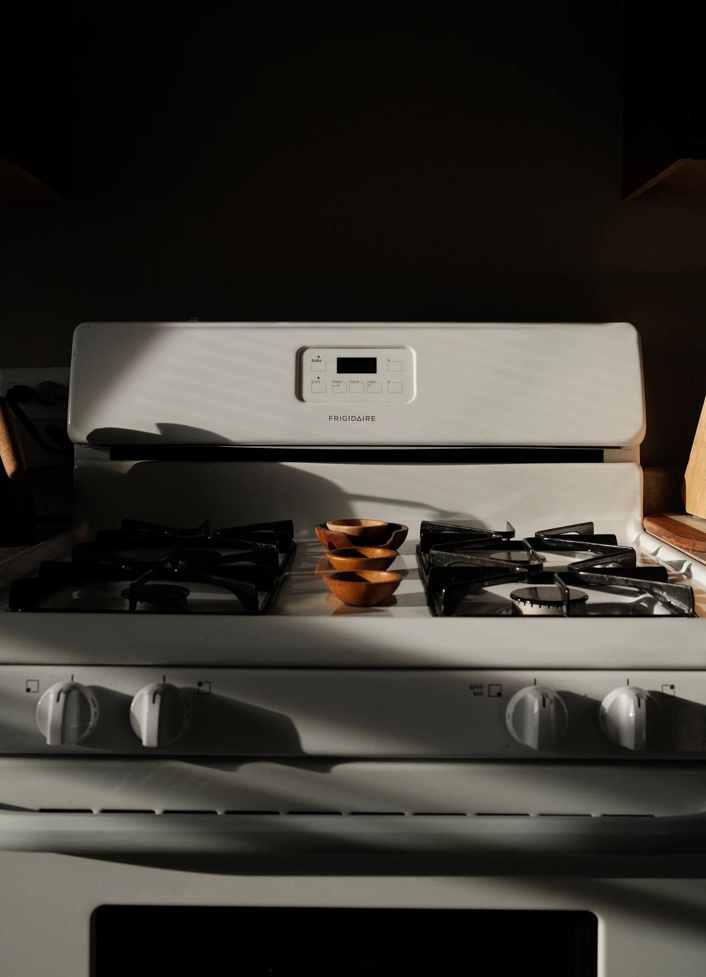 Gas range and cooking surface in a clean fitted kitchen