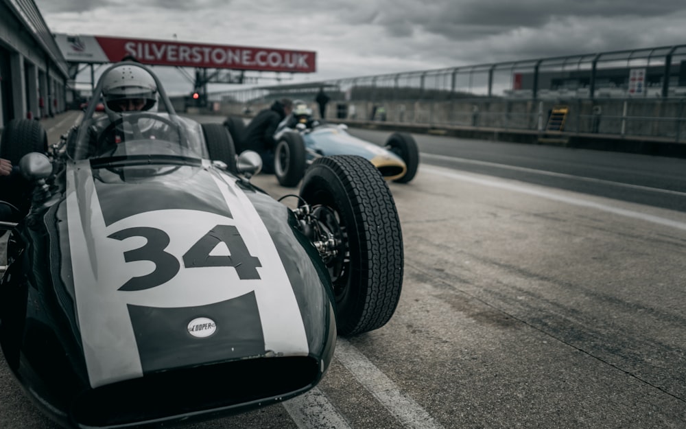 black and white sports car on road during daytime