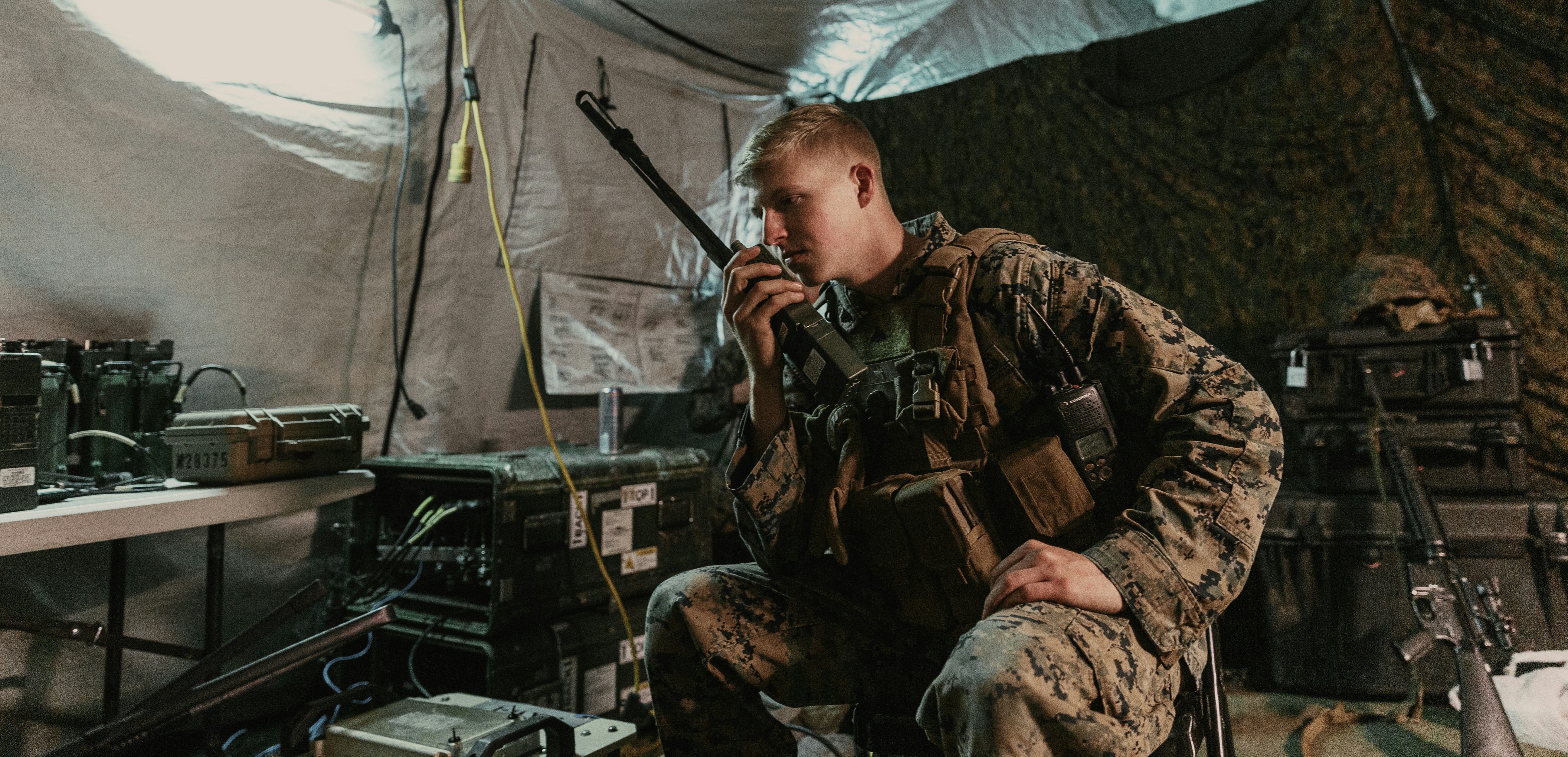 military defense operator reviewing satellite telemetry screens