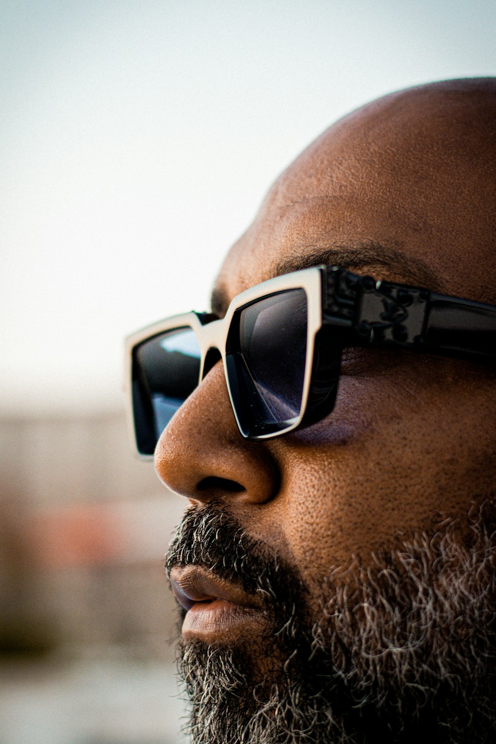 man wearing black sunglasses during daytime