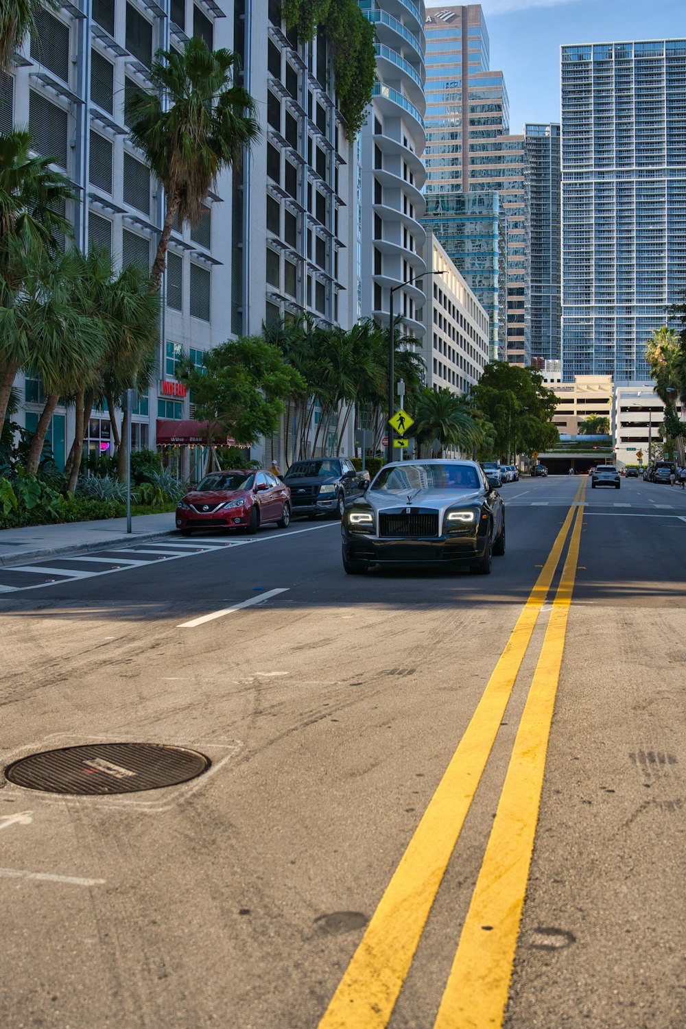 black car on road during daytime