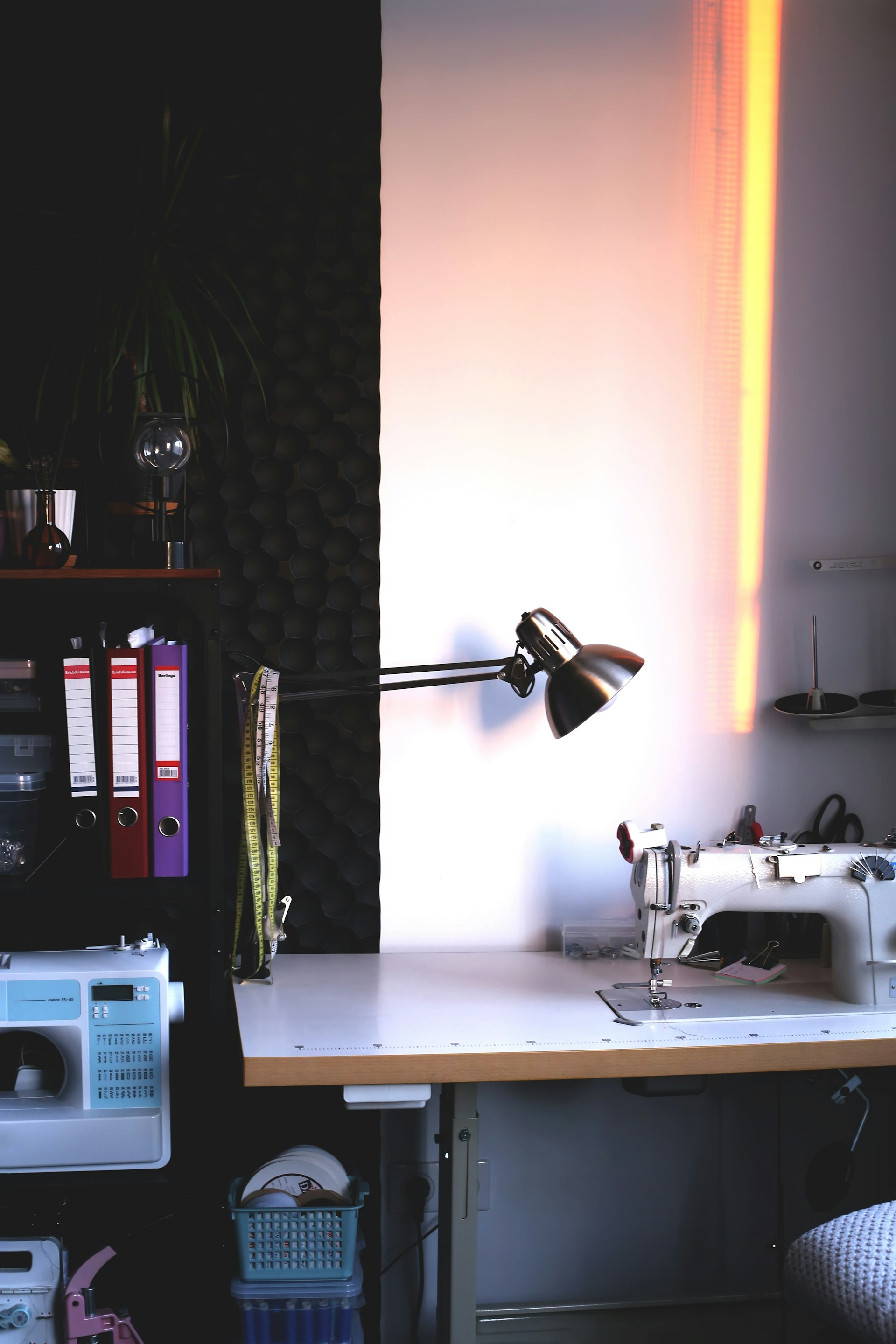 white sewing machine on white table