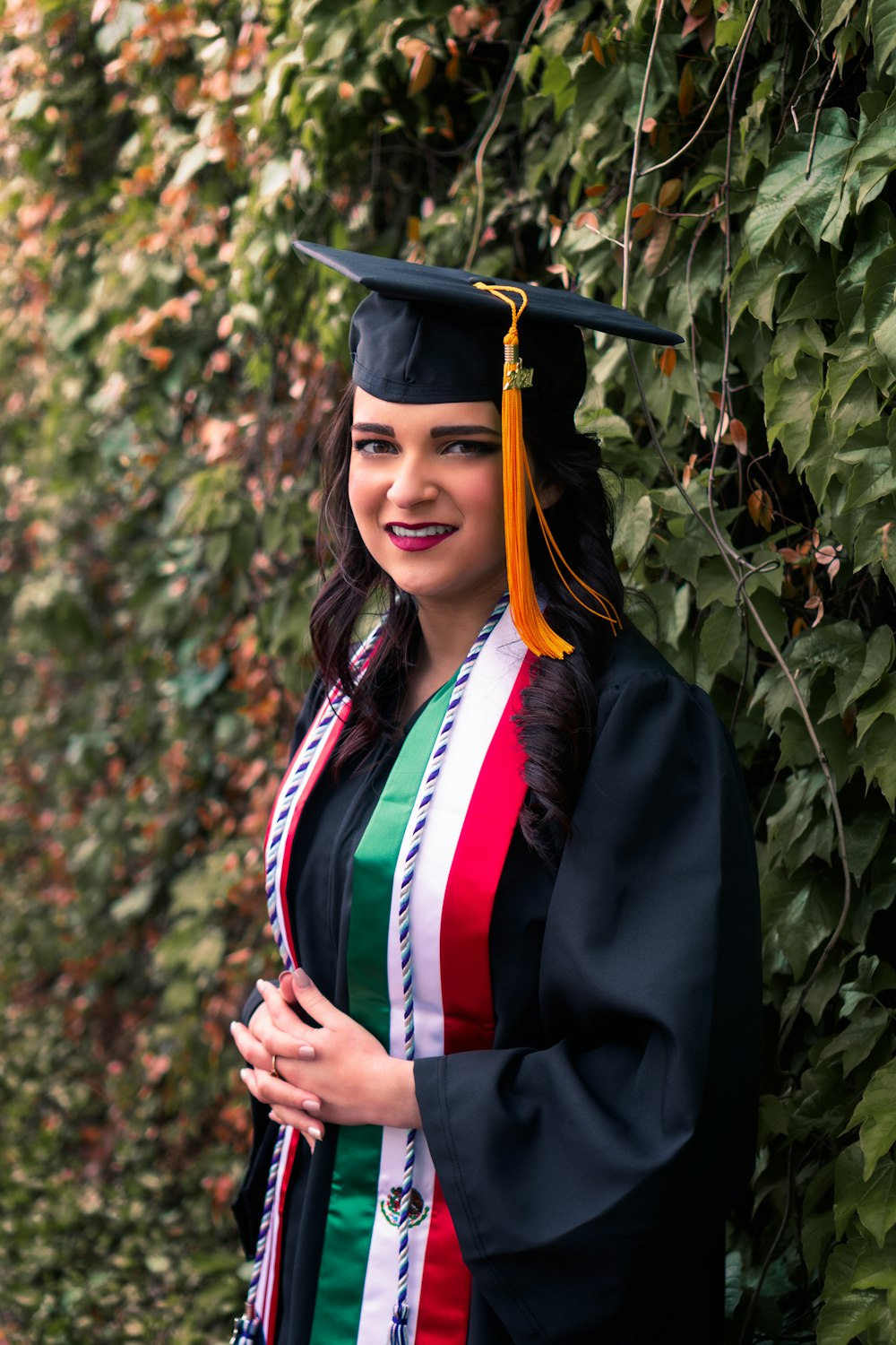 woman in academic dress and academic hat