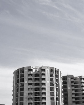 white concrete building under blue sky during daytime