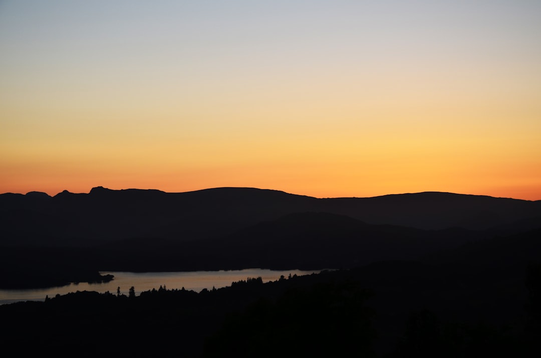 silhouette of mountain during sunset