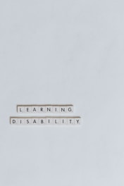 a computer keyboard with the words learning disability spelled on it