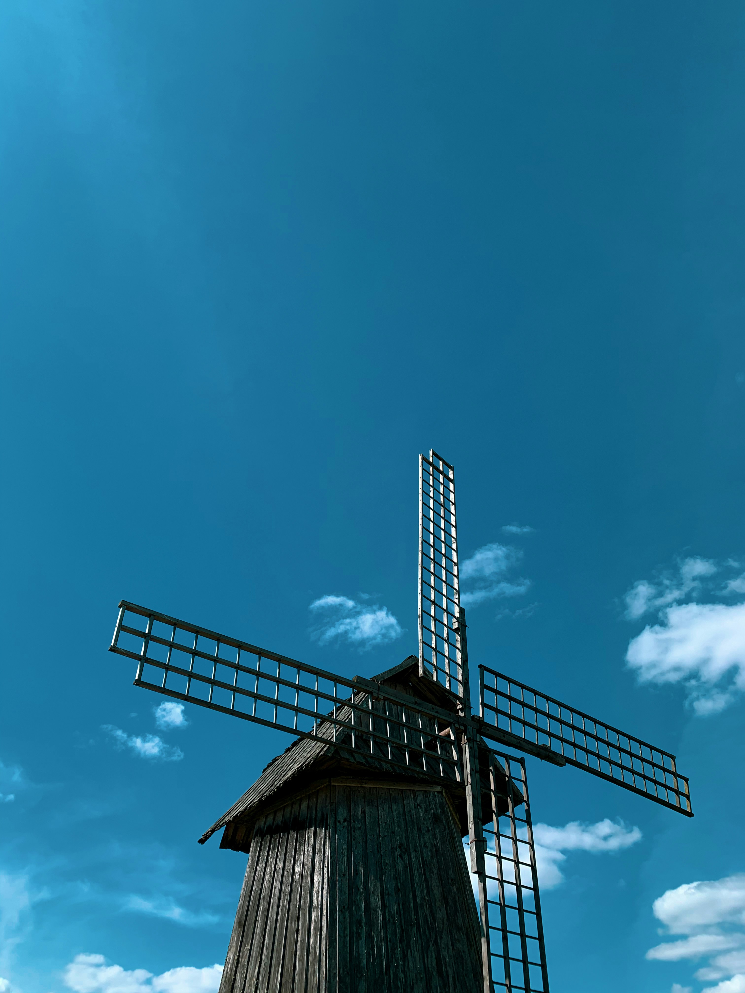 brown wooden house under blue sky