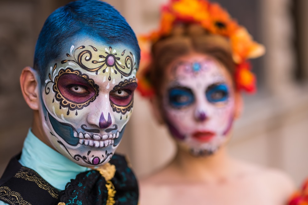 woman with blue and white face paint