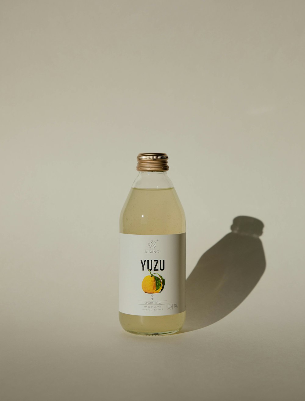 white and yellow labeled bottle