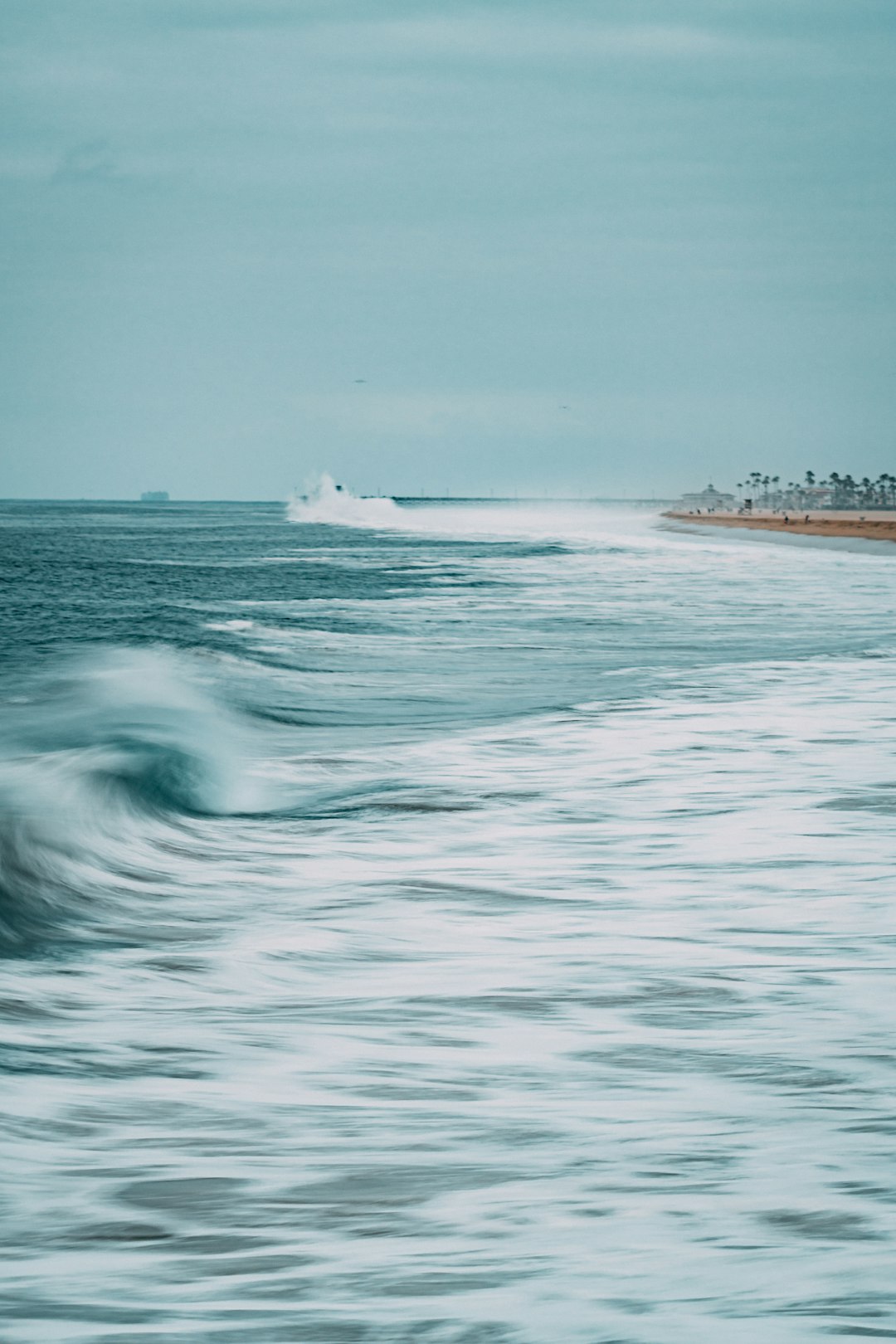 white and brown ship on sea during daytime