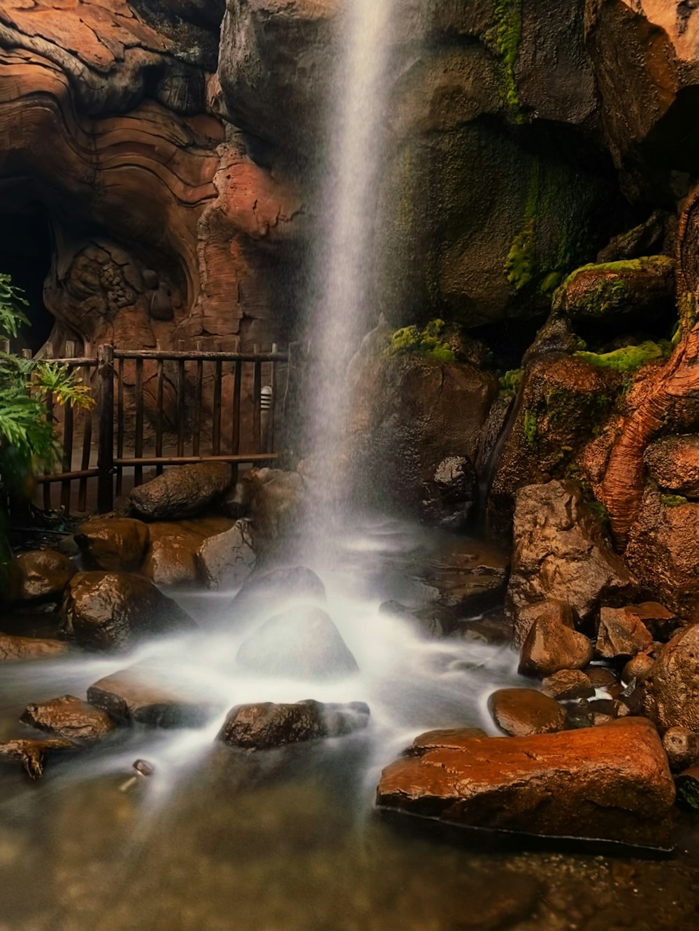 water falls in the middle of rocks