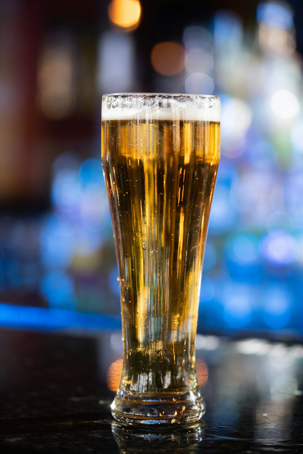 clear drinking glass with beer