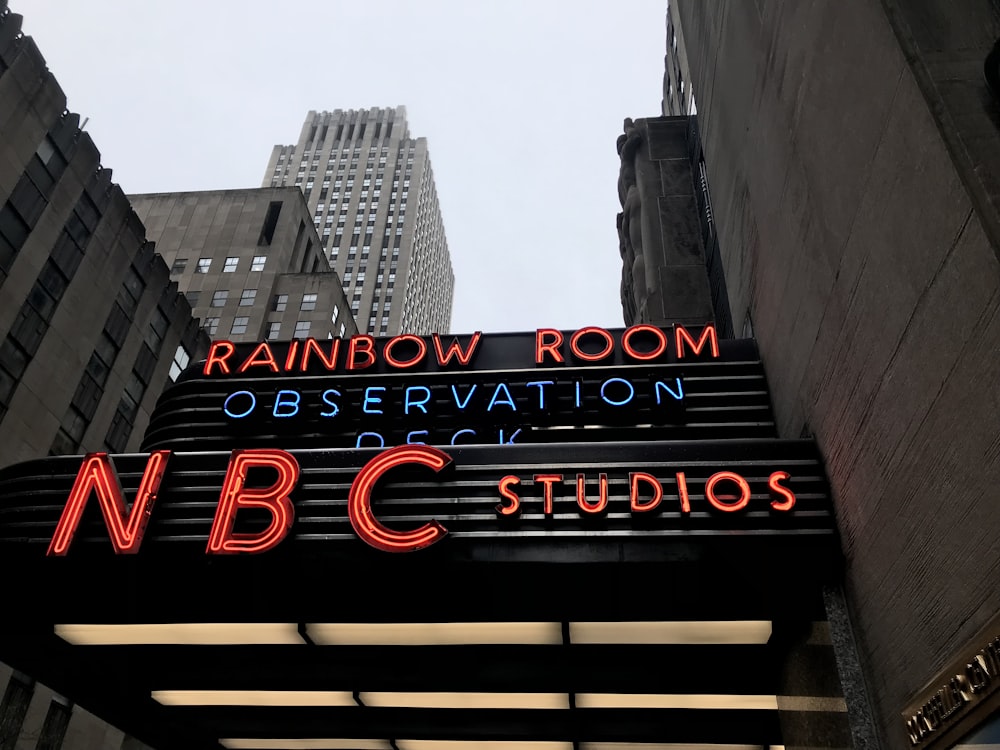 a neon sign on the side of a building