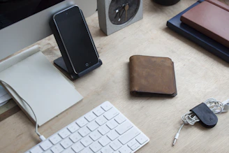 A neat workspace with essential office supplies arranged on a desk.