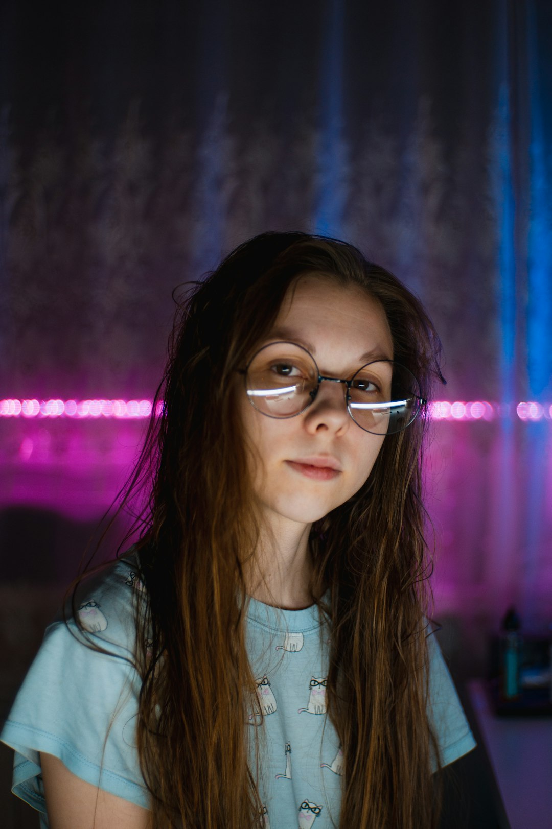 woman in white shirt wearing eyeglasses