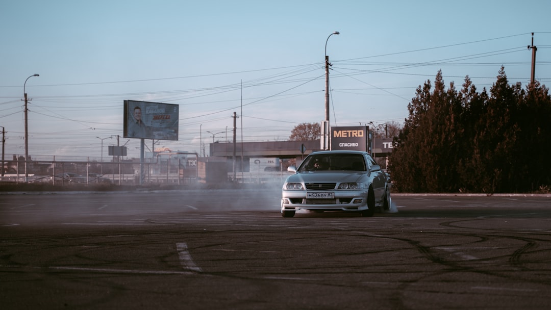 white car on road during daytime