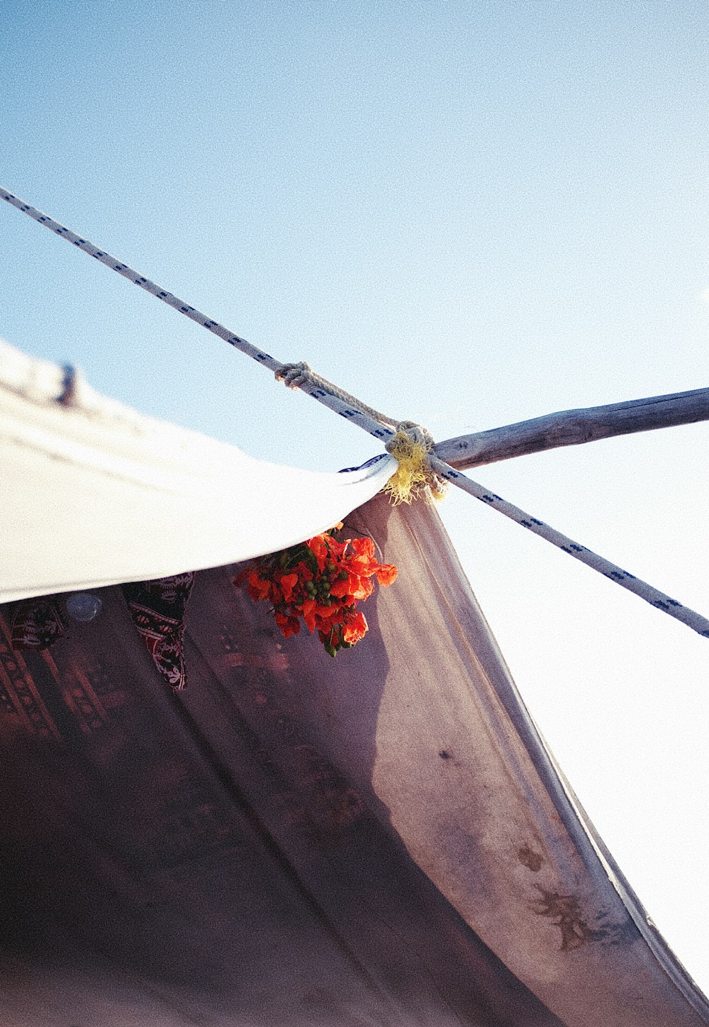 white textile hanging on wire