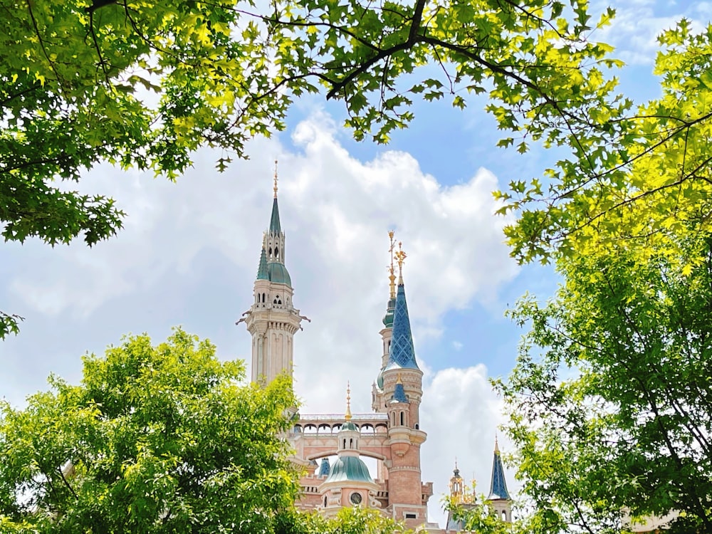 white and blue castle under blue sky during daytime