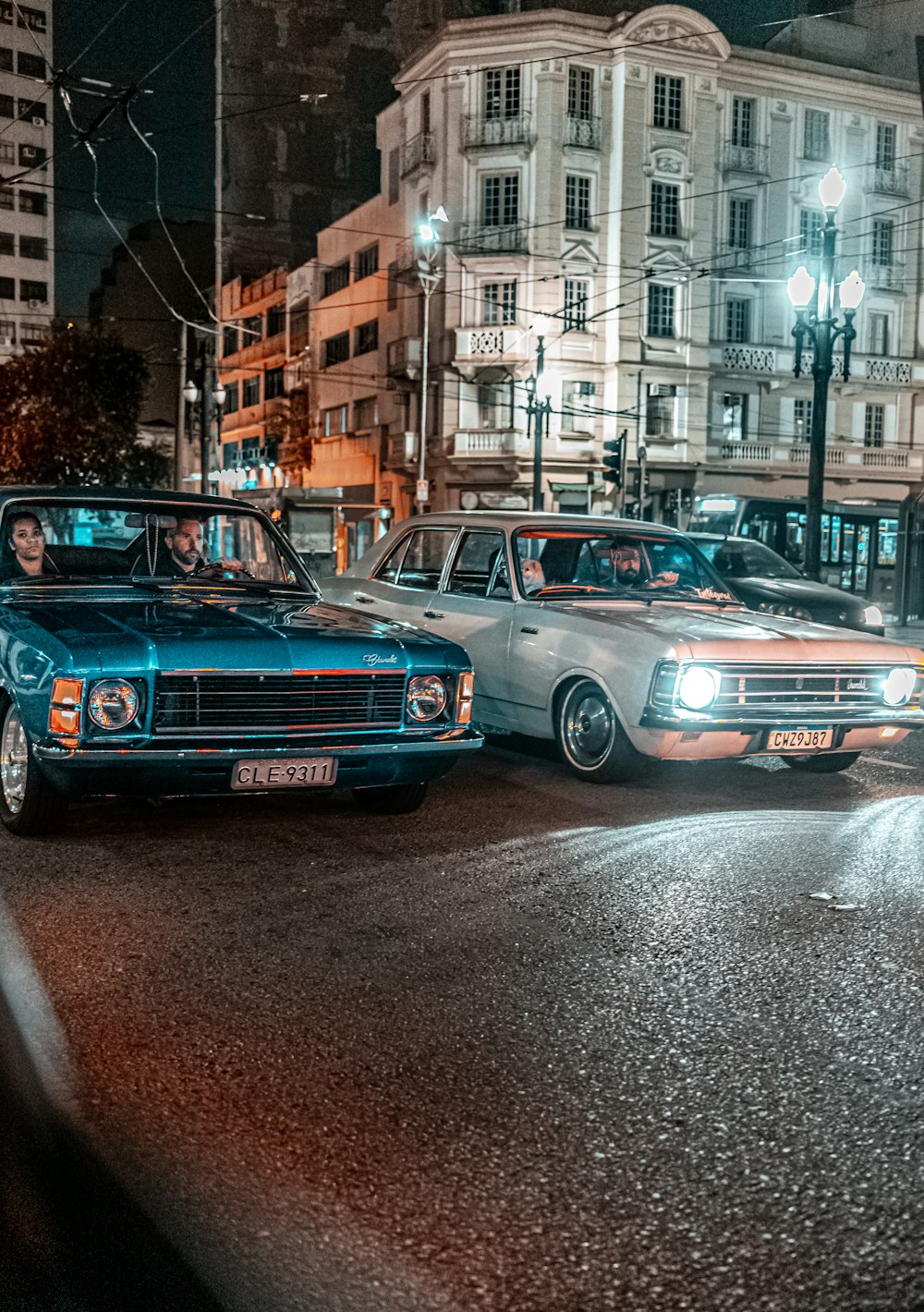 blue car on road during daytime