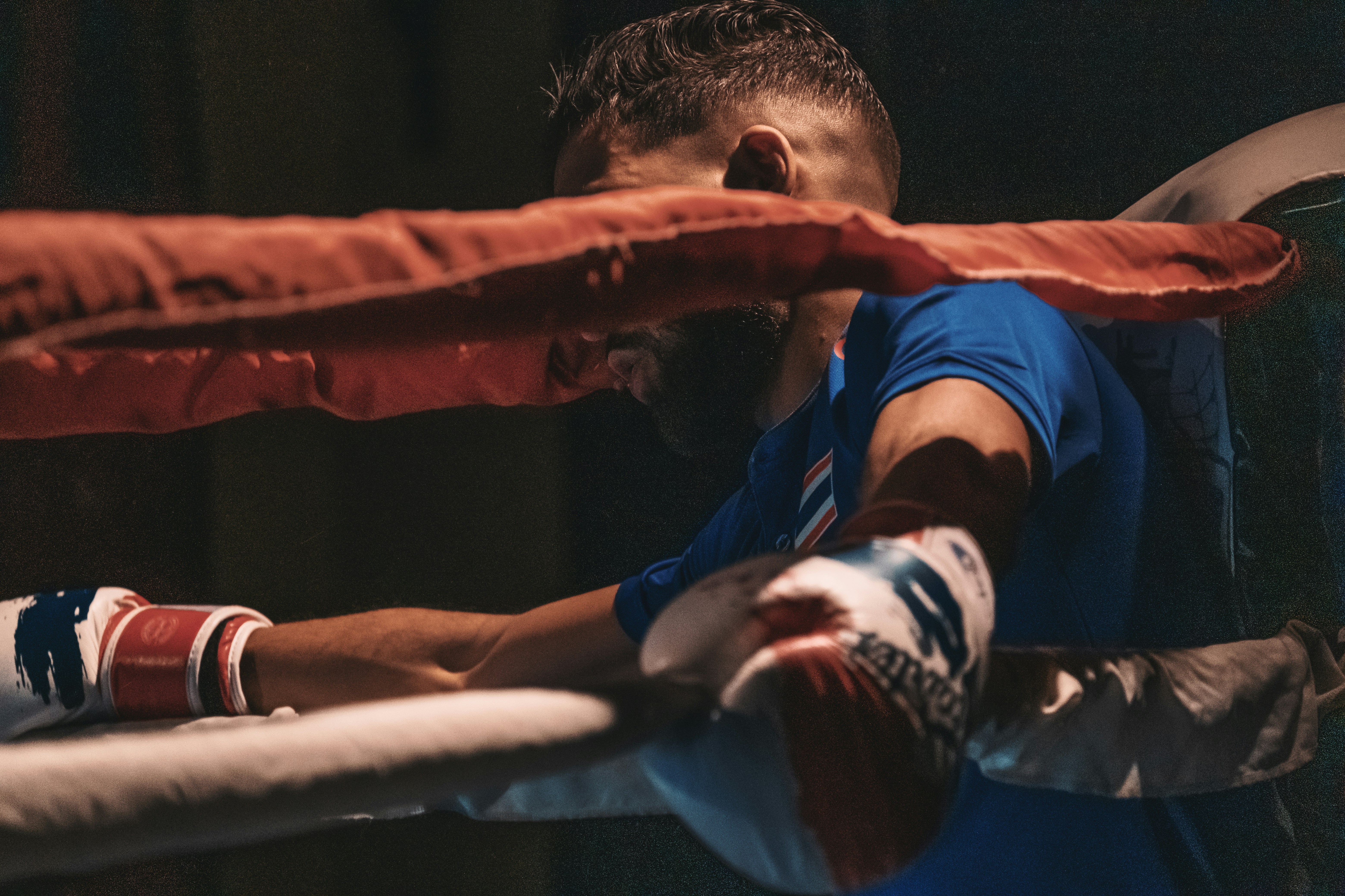 man in blue and orange jersey shirt