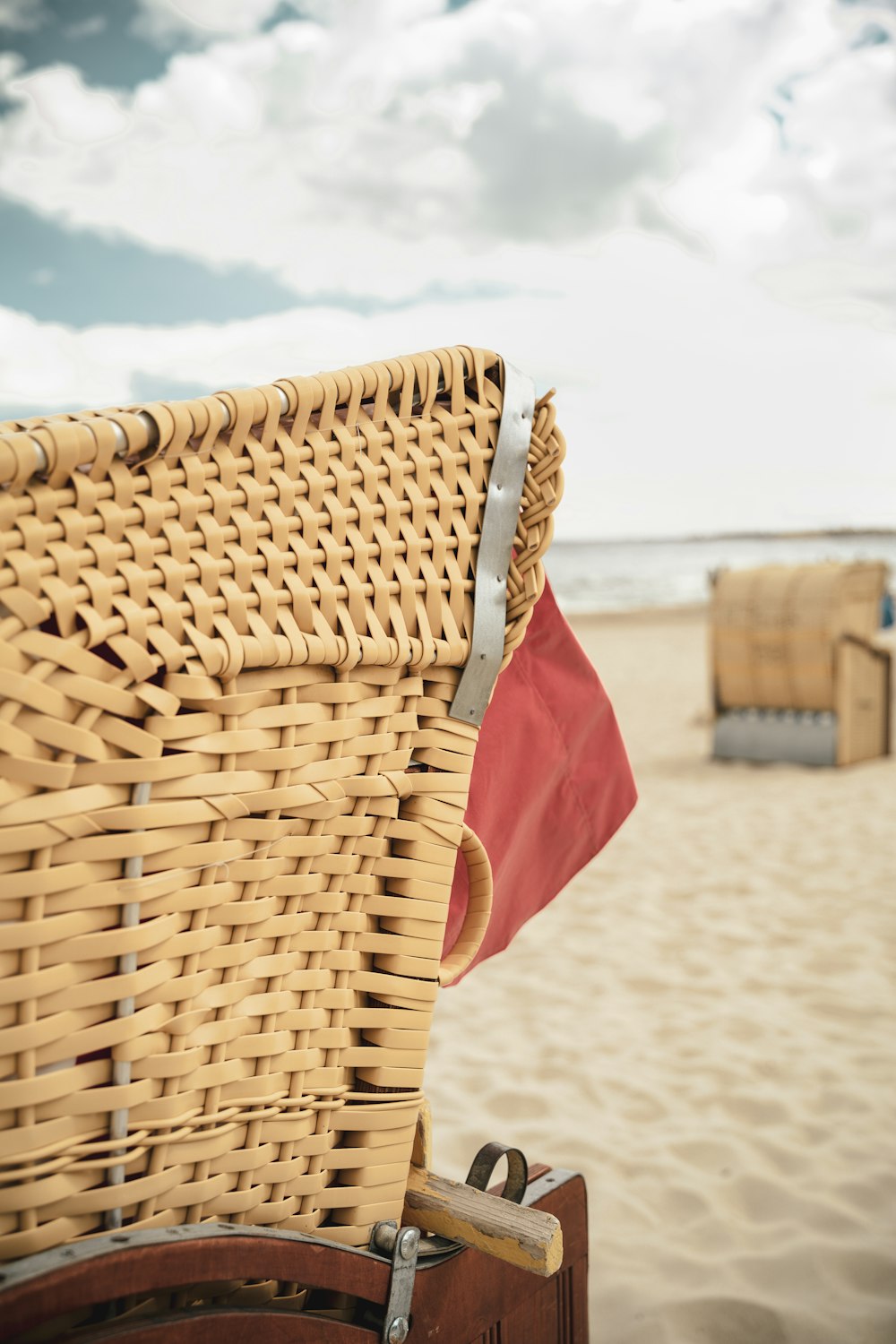 brown woven basket on beach during daytime