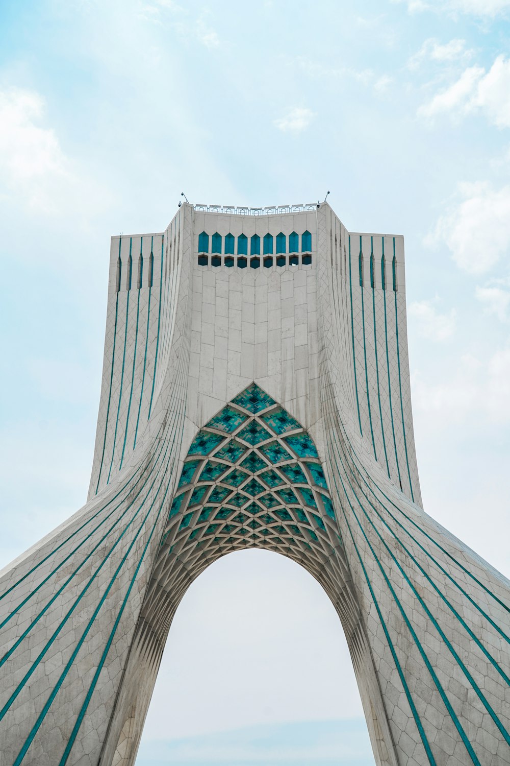 white concrete building under white sky during daytime