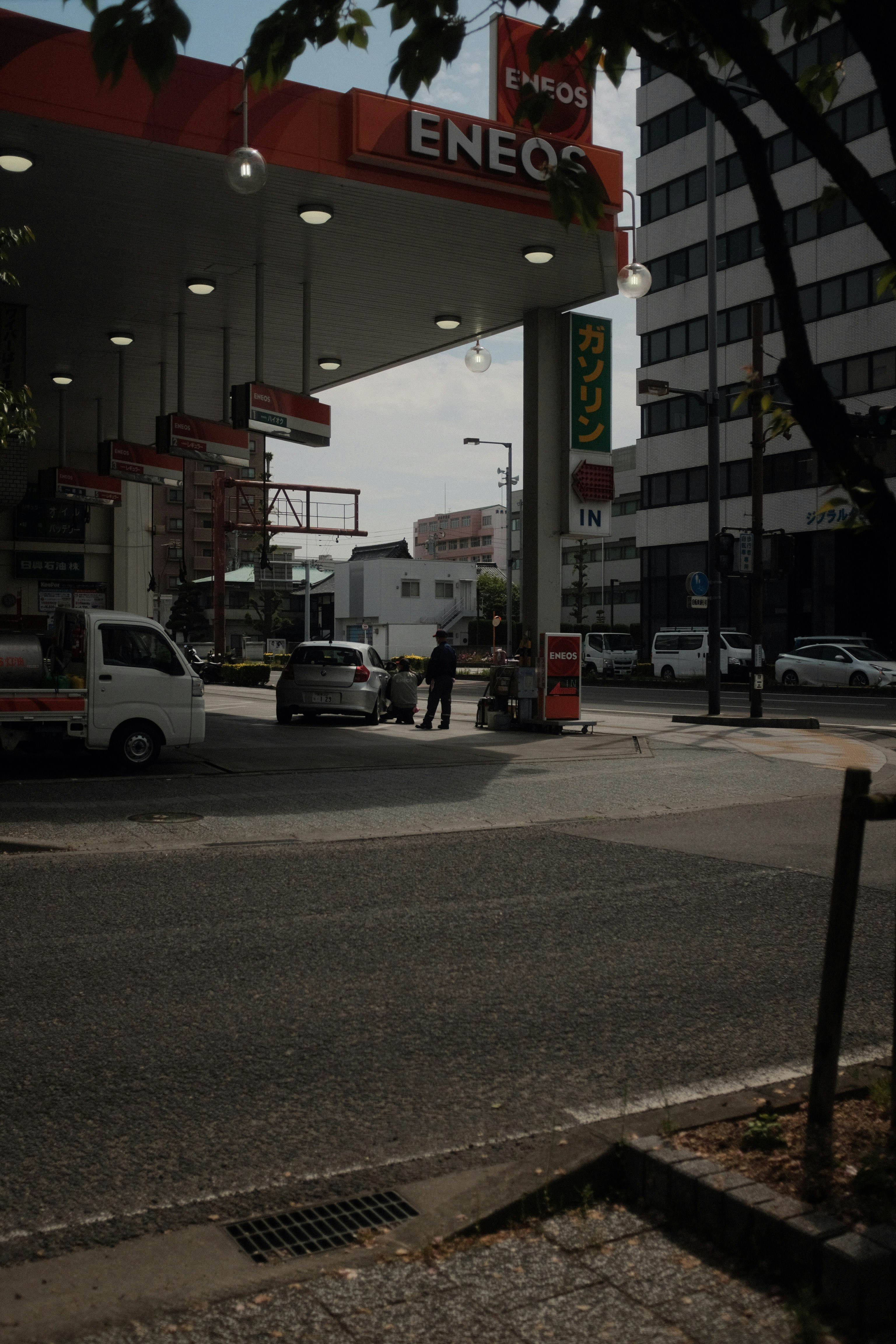 white van parked near store during daytime