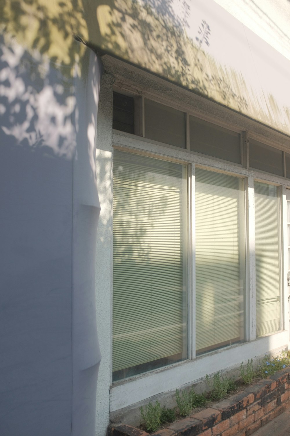 white wooden framed glass window