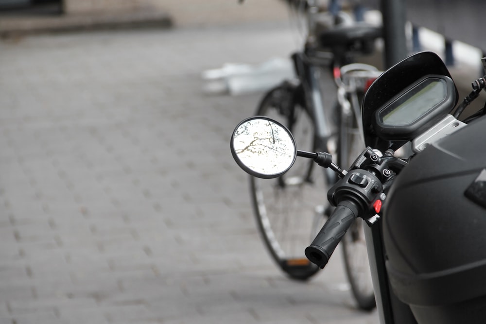 black motorcycle on road during daytime