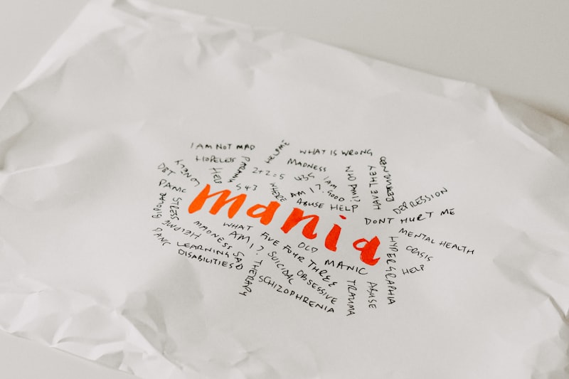 a piece of white paper with orange writing on it
