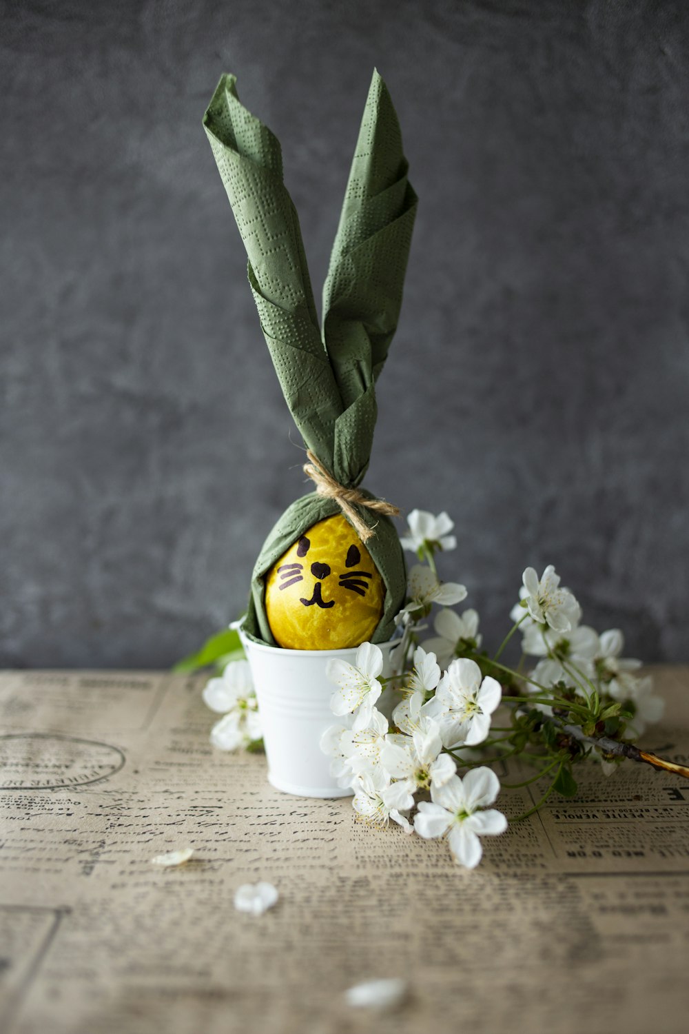 white flowers on white ceramic vase