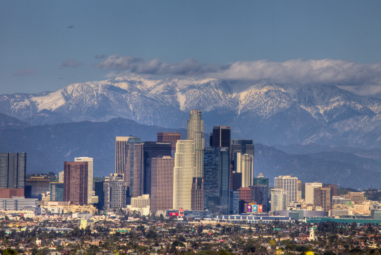 Downtown Los Angeles skyline under a blue sky