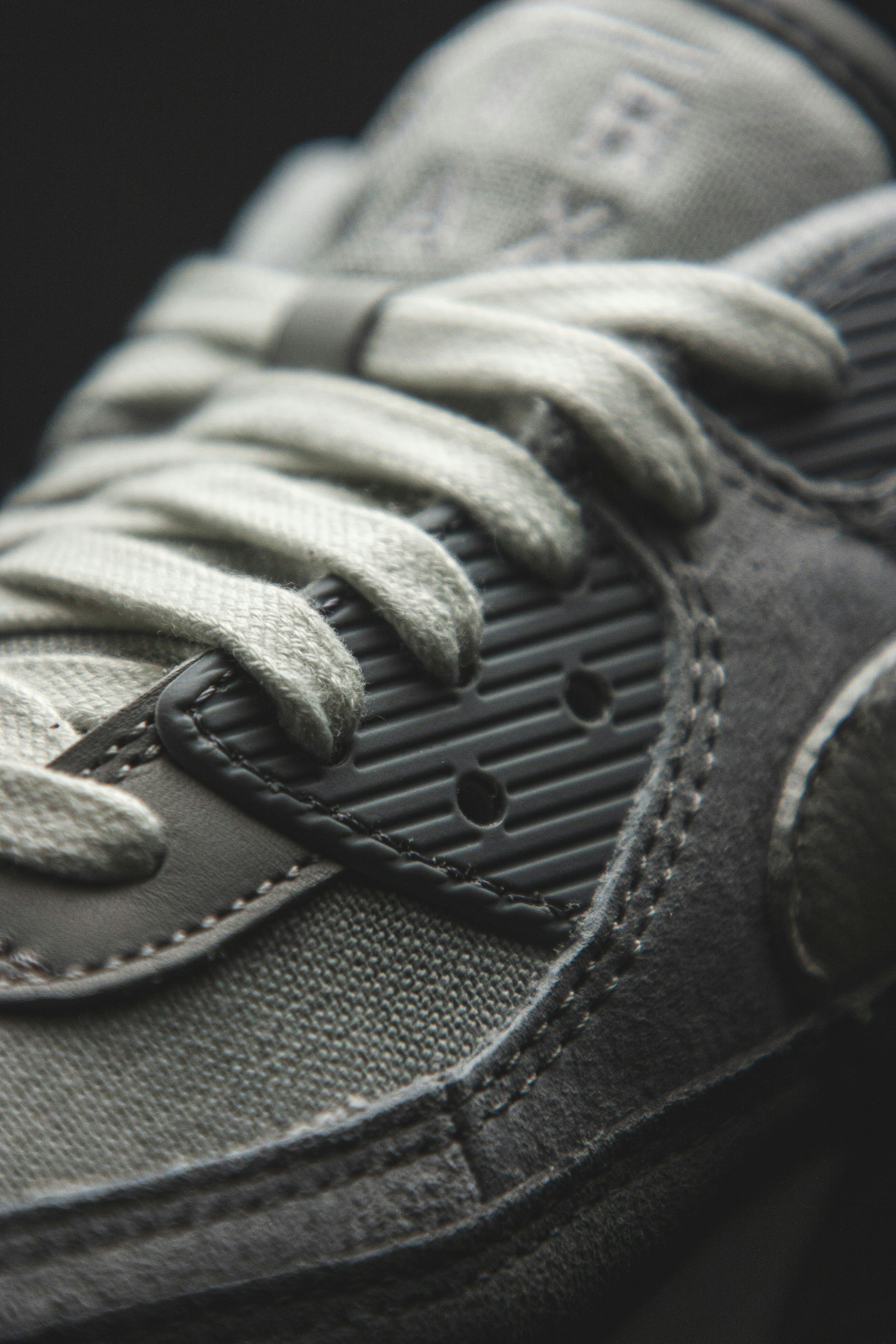 half white half black nike shoes