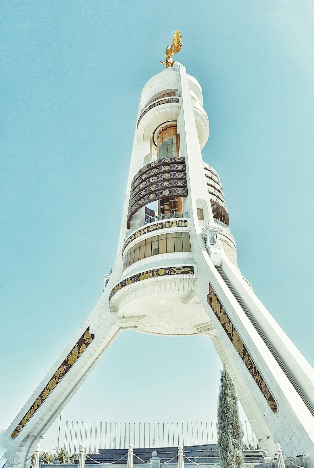 white concrete tower under blue sky during daytime