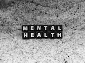 a black and white photo of the word mental health