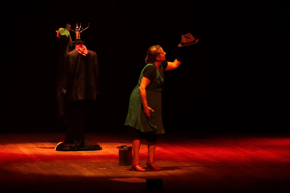 2 women standing on stage