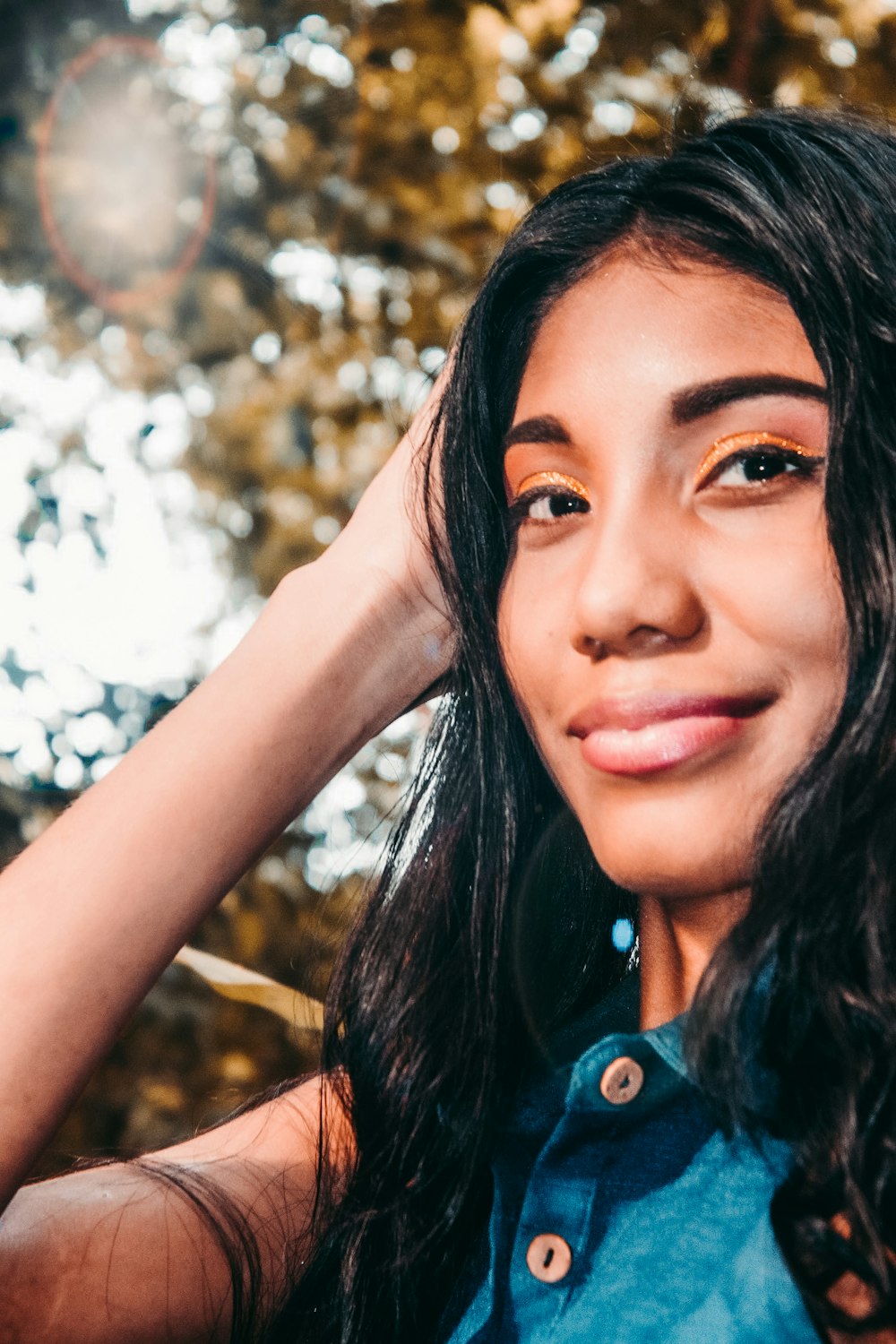 woman in blue denim button up shirt