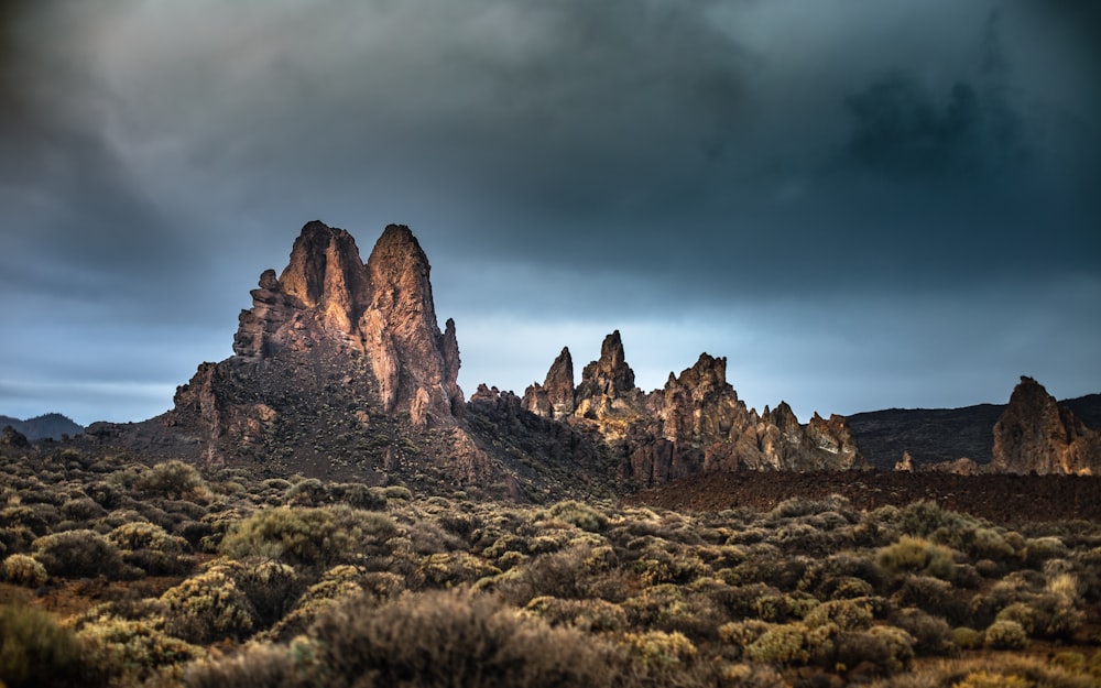 brown rock formation under blue sky during daytime